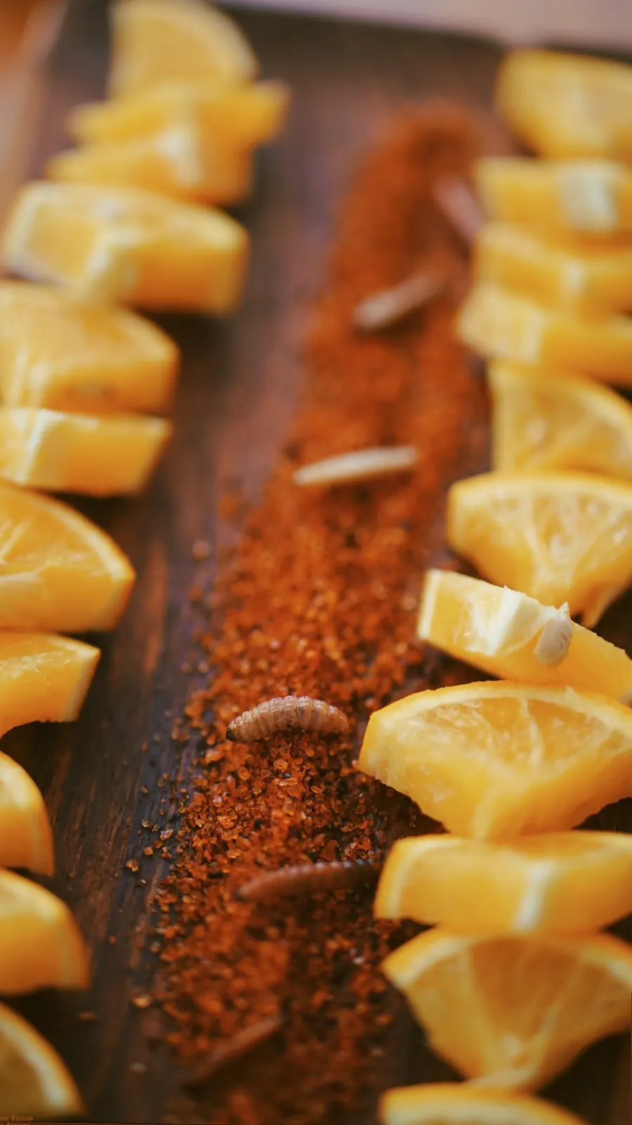 Sliced citrus with chili and spice