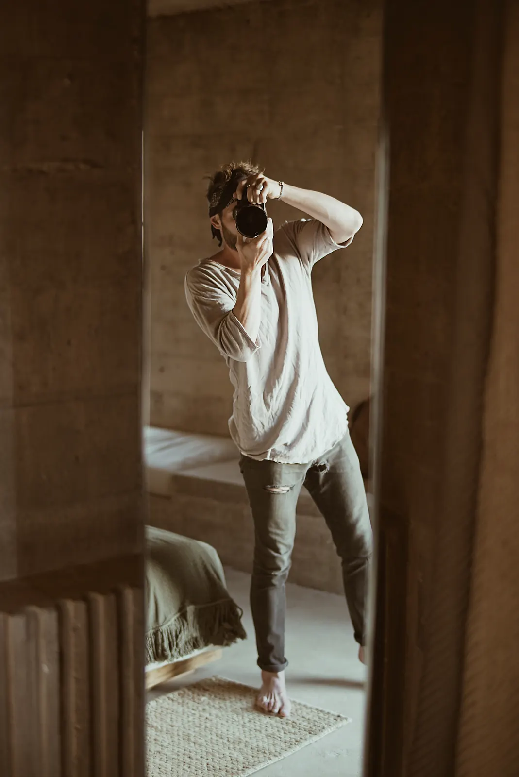 Matthew Nadu photographing in window light